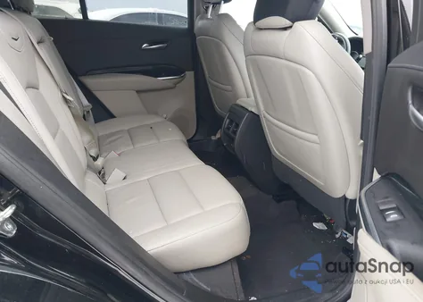 2022 Cadillac Xt4 Awd Premium Luxury from USA, damaged, VIN 1GYFZDR48NF127705